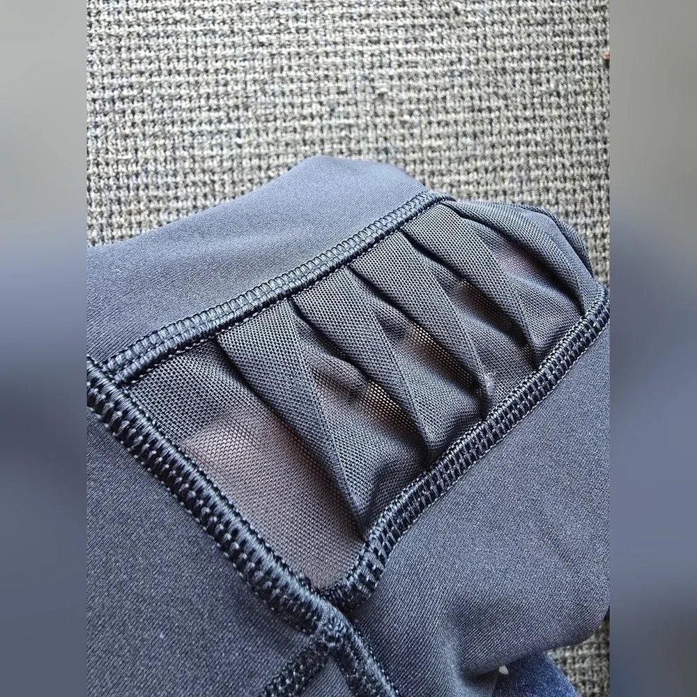 Lululemon Athletica Black Capris with Mesh Accents